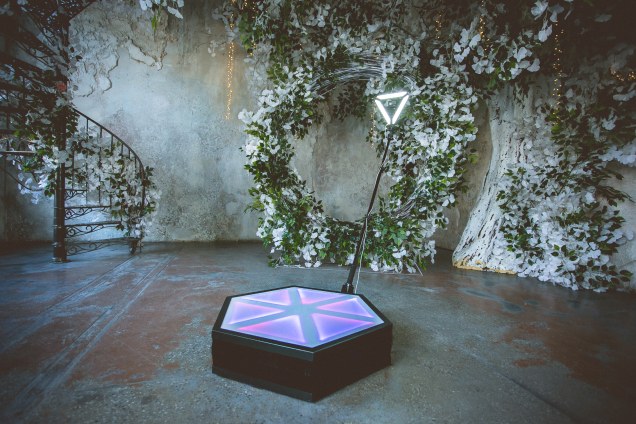 Spinner 360 platform and adjustable arm assembled at a venue